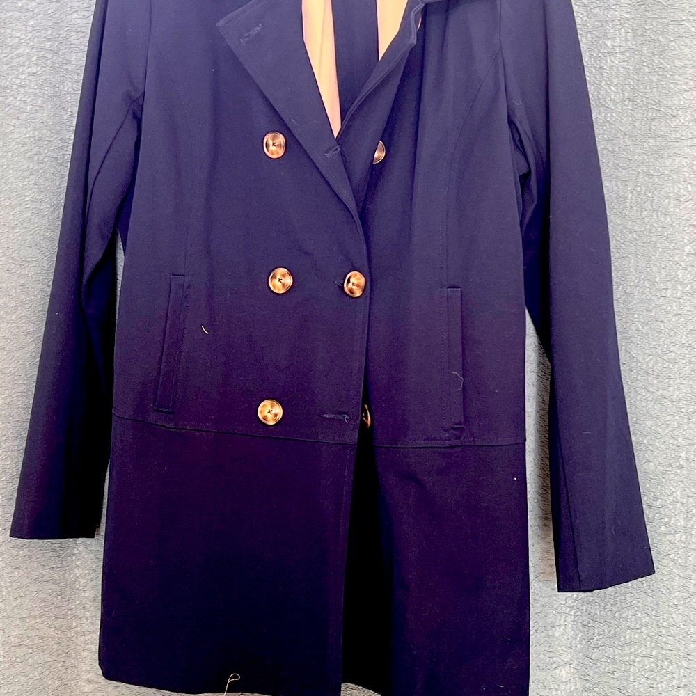 NWT Women’s trench coat never worn